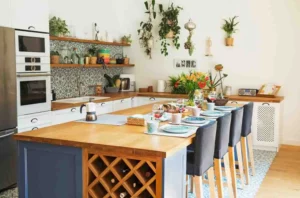 Kitchen Island Ideas featuring a modern wooden kitchen island with built-in wine storage, Kitchen Island Seating, bar stools, ample Kitchen Storage, and stylish Pendant Lighting inspiration for a functional Kitchen Layout.
